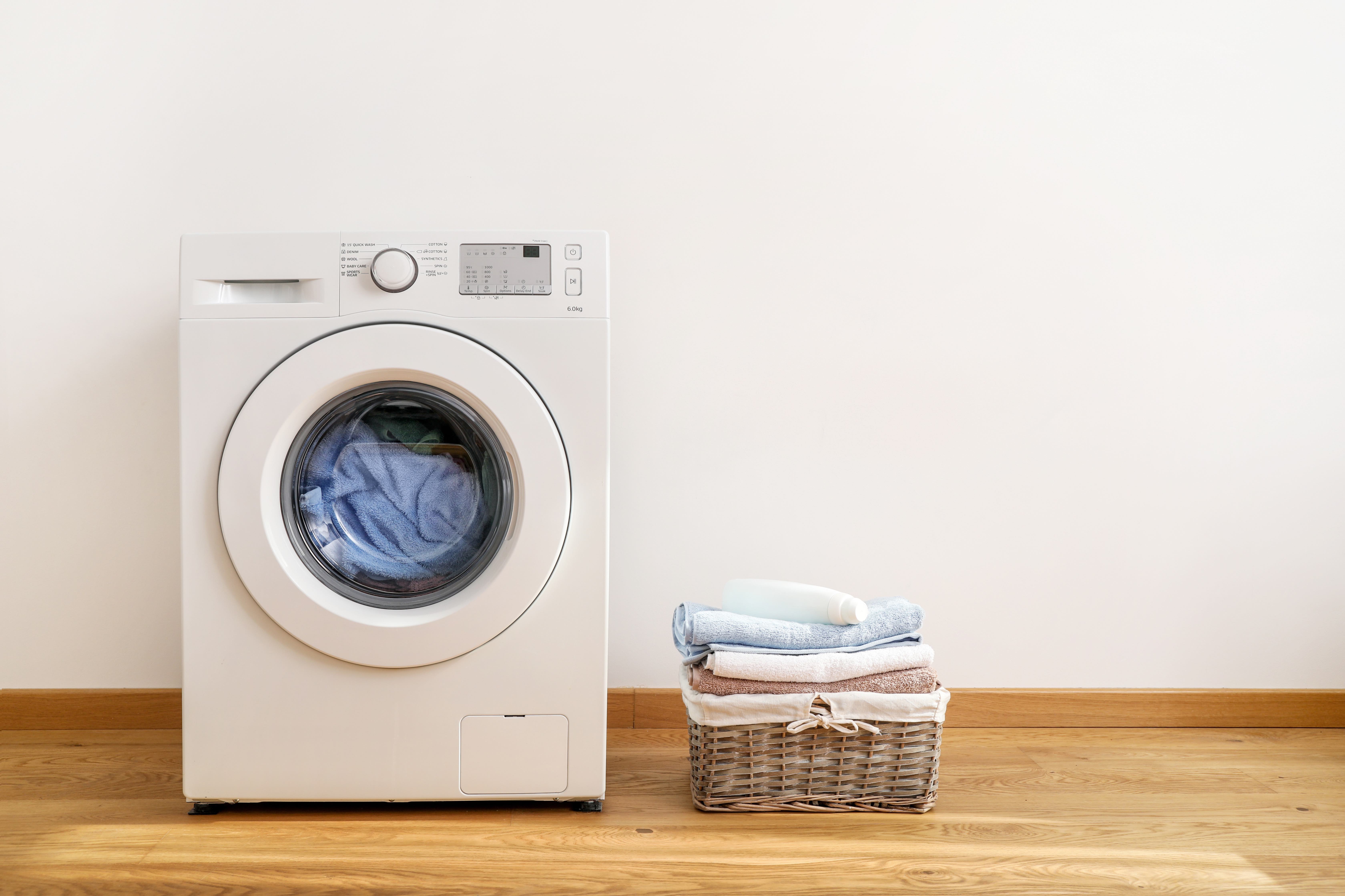 stack-of-folded-towels-and-branch